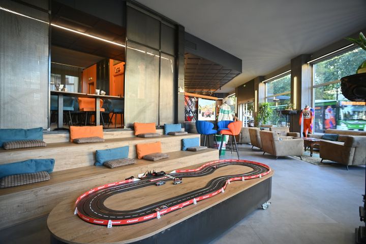 Common area with slot car track at Admiral Hotel Milano